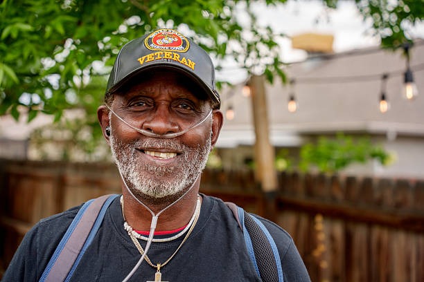 Imageye Imgi 6 Outdoor Portrait African American Marine Veteran In His Seventies Wearing Oxygen Mask And